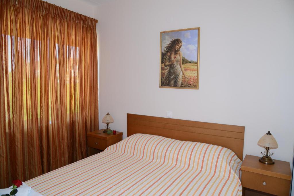 Posteľ alebo postele v izbe v ubytovaní Maria's Filoxenia Suites