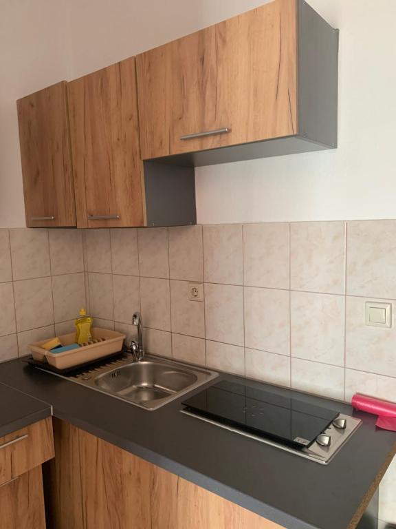 Kuchyňa alebo kuchynka v ubytovaní Panorama sea view Apartment H