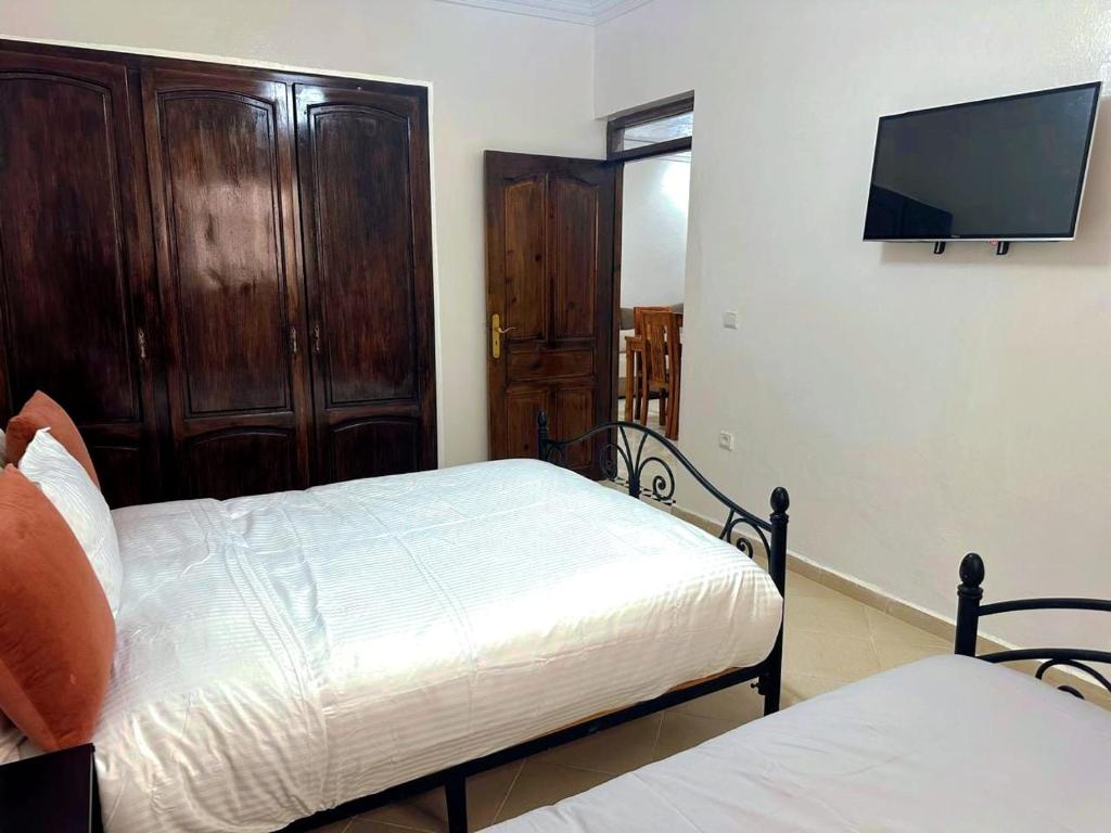 Postel nebo postele na pokoji v ubytování Maison Othmane