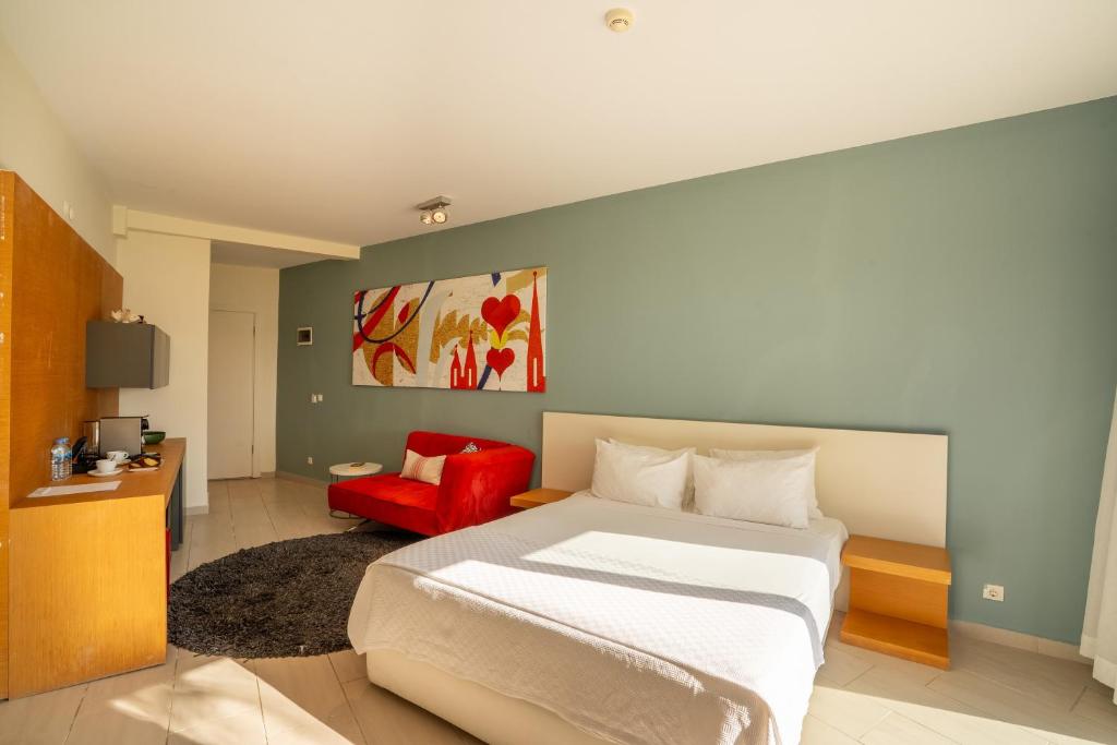A bed or beds in a room at Med-Inn Hotel