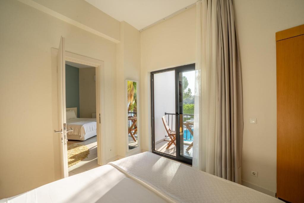 A bed or beds in a room at Med-Inn Hotel
