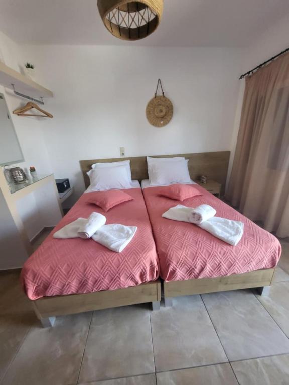 Postel nebo postele na pokoji v ubytování Stelios Apartment
