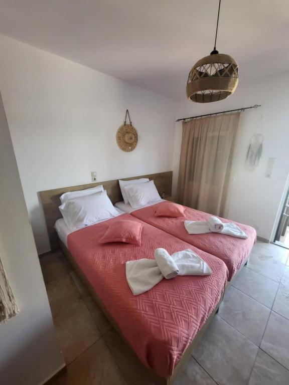 Postel nebo postele na pokoji v ubytování Stelios Apartment