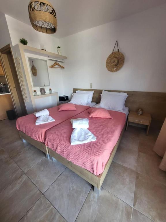 Postel nebo postele na pokoji v ubytování Stelios Apartment