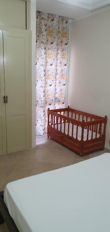 Postel nebo postele na pokoji v ubytování Residence CHAHD