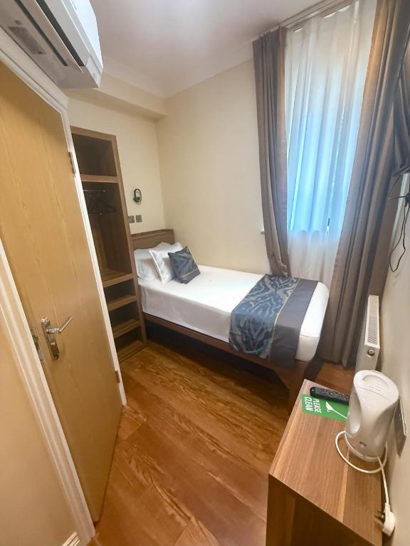 Olympia Inn Hotel - Resim 7