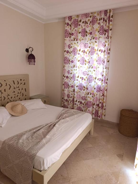Postel nebo postele na pokoji v ubytování Residence CHAHD