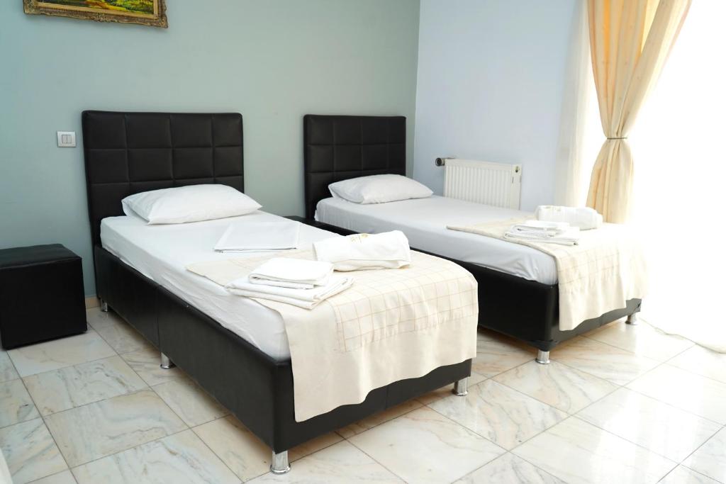 Postel nebo postele na pokoji v ubytování Hotel Bliss