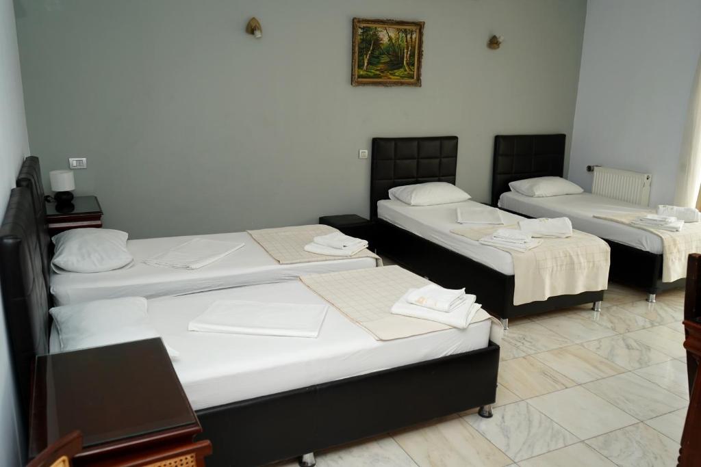 Postel nebo postele na pokoji v ubytování Hotel Bliss