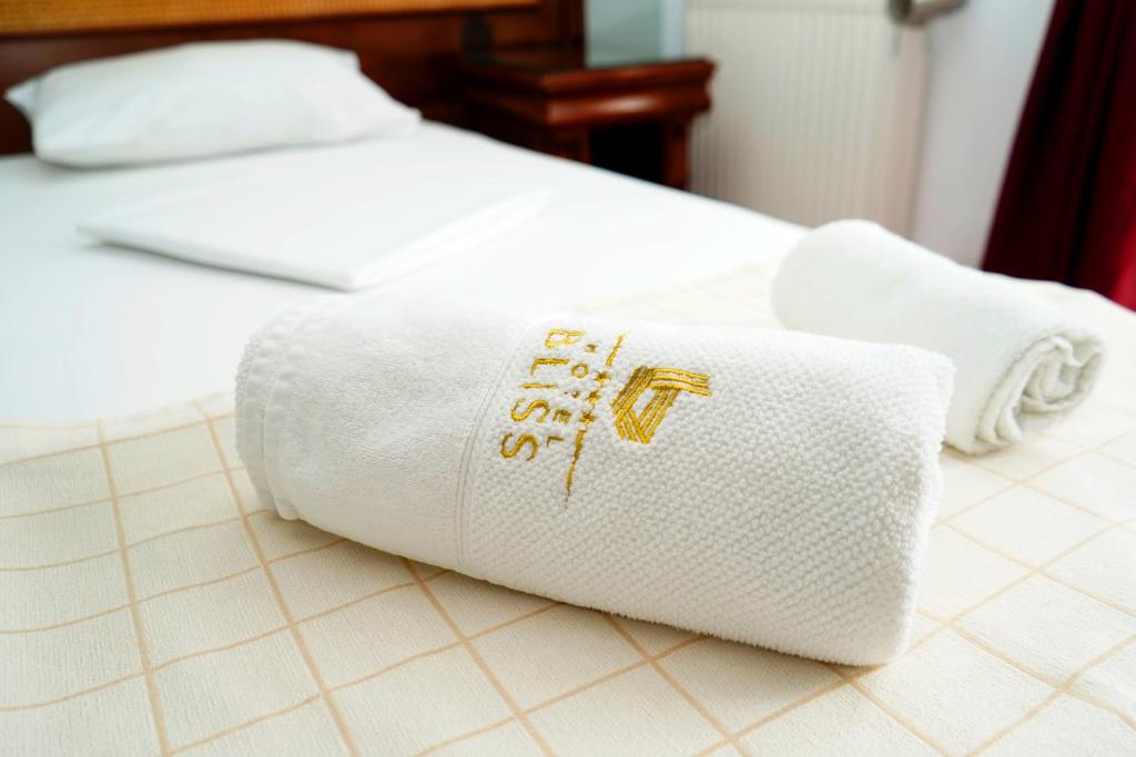 Postel nebo postele na pokoji v ubytování Hotel Bliss