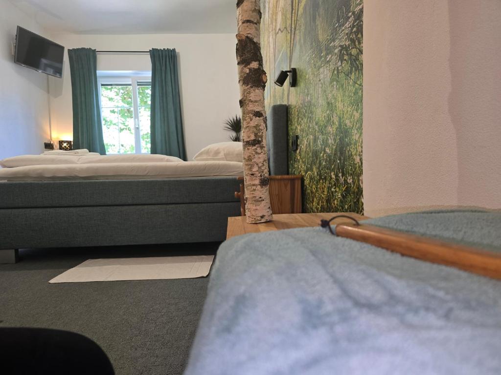 Postel nebo postele na pokoji v ubytování Gasthof zum Schiffmeister