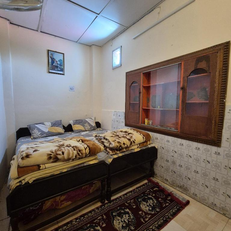 Postel nebo postele na pokoji v ubytování TATHASTU Bir -Homestay ,DORM,HOSTEL