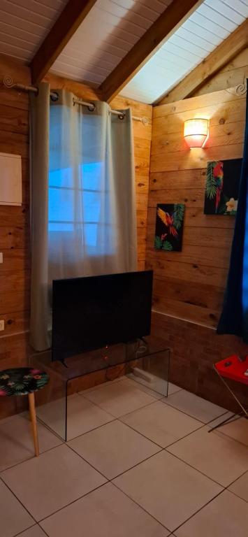 Posezení v ubytování Petit coin de paradis