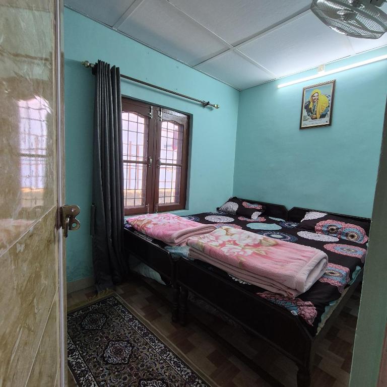 Postel nebo postele na pokoji v ubytování TATHASTU Bir -Homestay ,DORM,HOSTEL