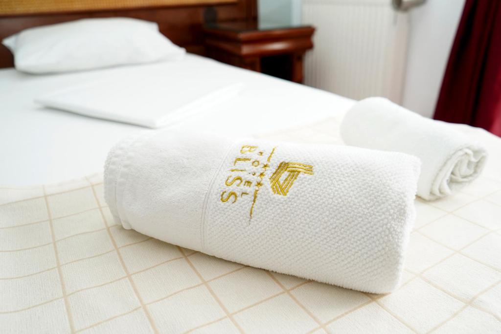 Postel nebo postele na pokoji v ubytování Hotel Bliss