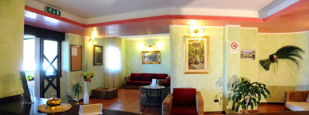 Posezení v ubytování Hotel Alisma