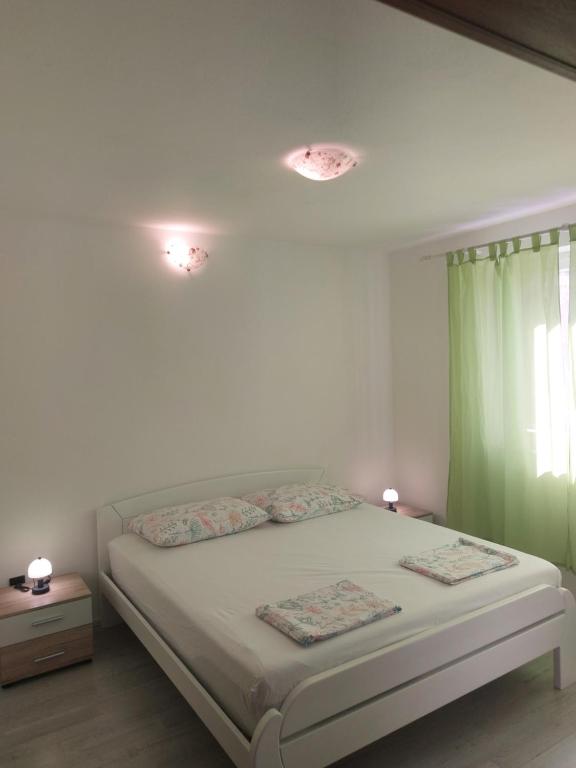 Postel nebo postele na pokoji v ubytování Croatia Apartman Masa