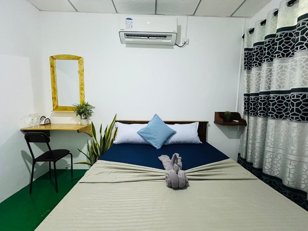 Ένα ή περισσότερα κρεβάτια σε δωμάτιο στο Jaya Residence - Near Airport