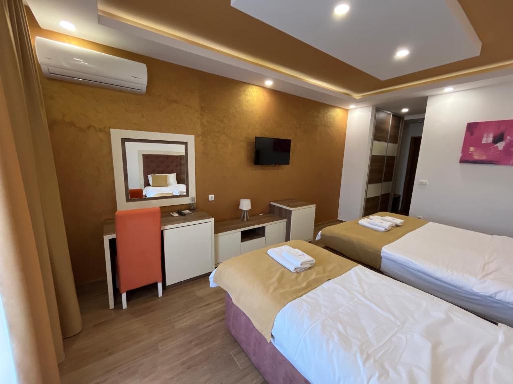 Postel nebo postele na pokoji v ubytování Heaven Lux Ulcinj