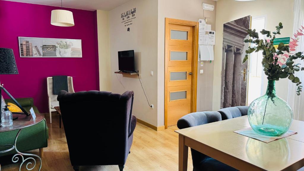 TV a/nebo společenská místnost v ubytování Apartamentos Alcazar de Baeza