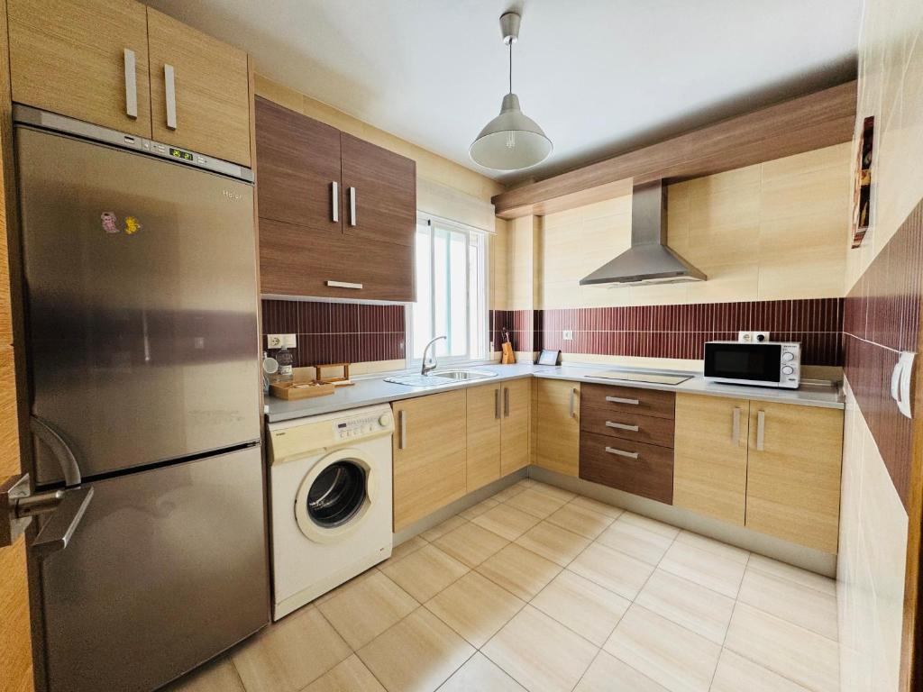Kuchyň nebo kuchyňský kout v ubytování Apartamentos Alcazar de Baeza