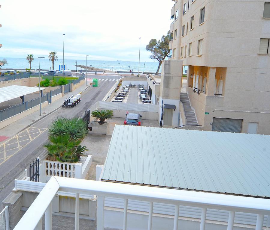 an overhead view of a building with a white roof at LA CURVA Orange Costa in Benicàssim