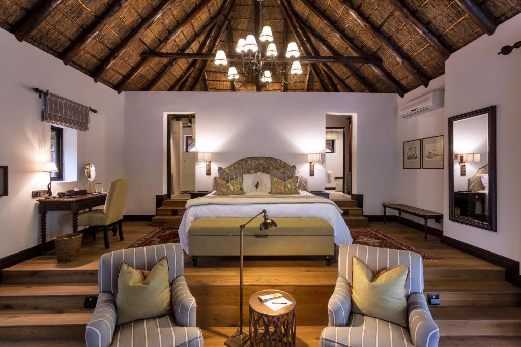Postel nebo postele na pokoji v ubytování Lalibela Game Reserve - Kichaka Lodge