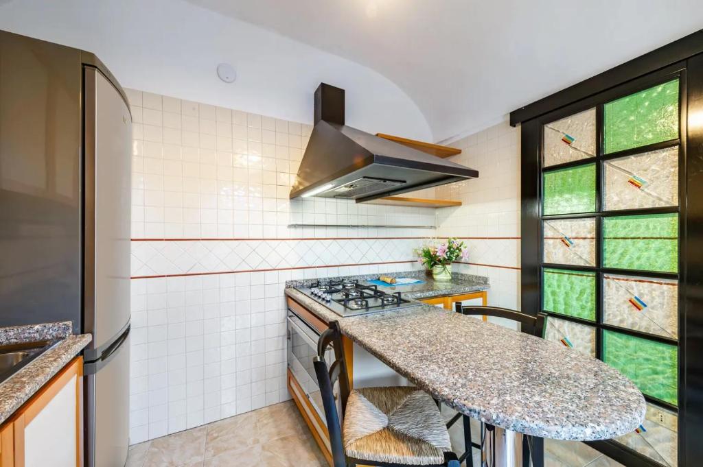 Kuchyň nebo kuchyňský kout v ubytování Appartamento in centro 65mq x 4 persone