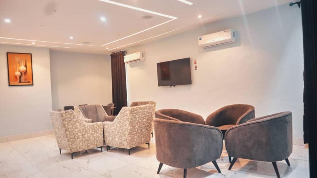 TV a/nebo společenská místnost v ubytování De Padova Hotel