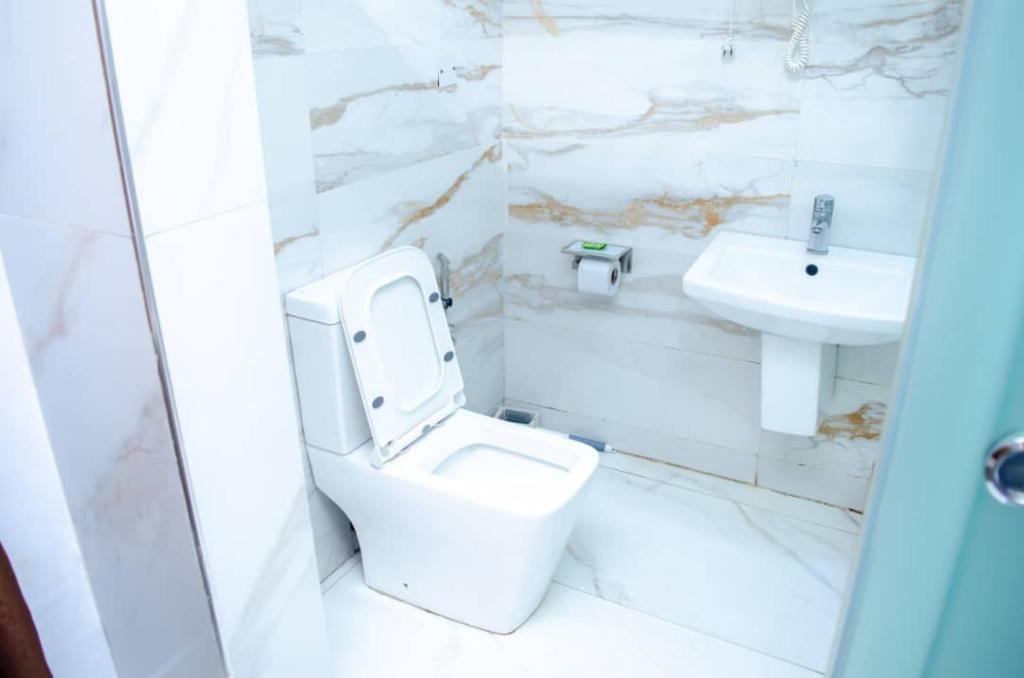 Koupelna v ubytování De Padova Hotel