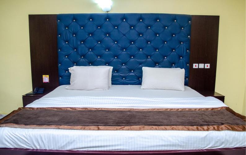 Postel nebo postele na pokoji v ubytování De Padova Hotel