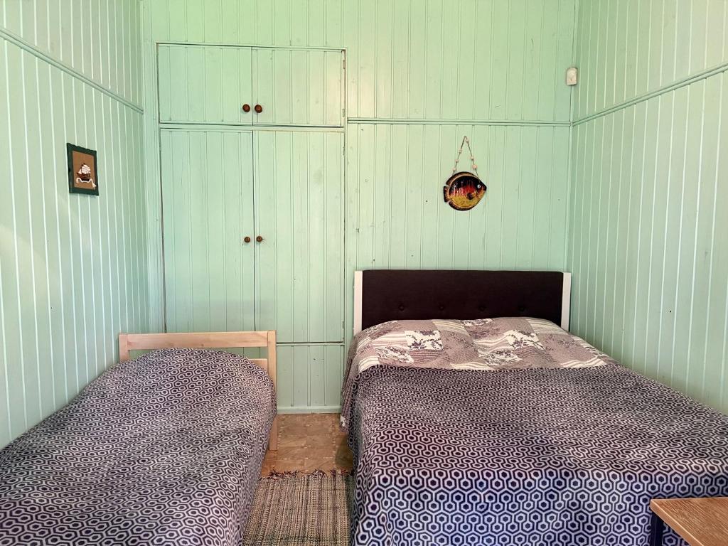 Postel nebo postele na pokoji v ubytování Vesiroos Villa