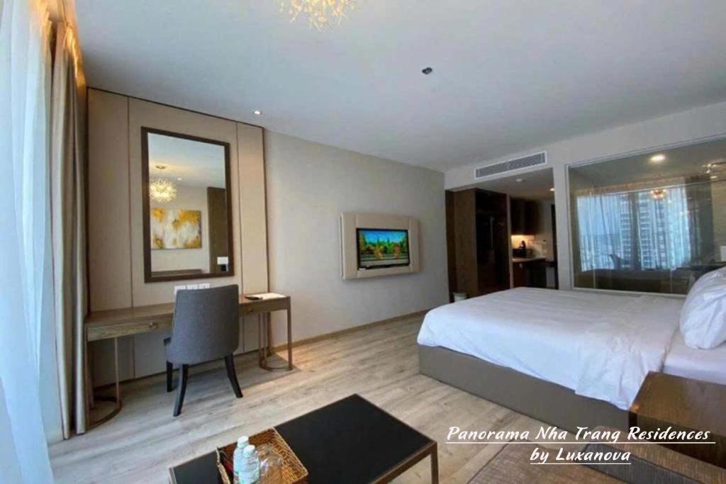 Postel nebo postele na pokoji v ubytování Panorama Nha Trang Residences by Luxanova