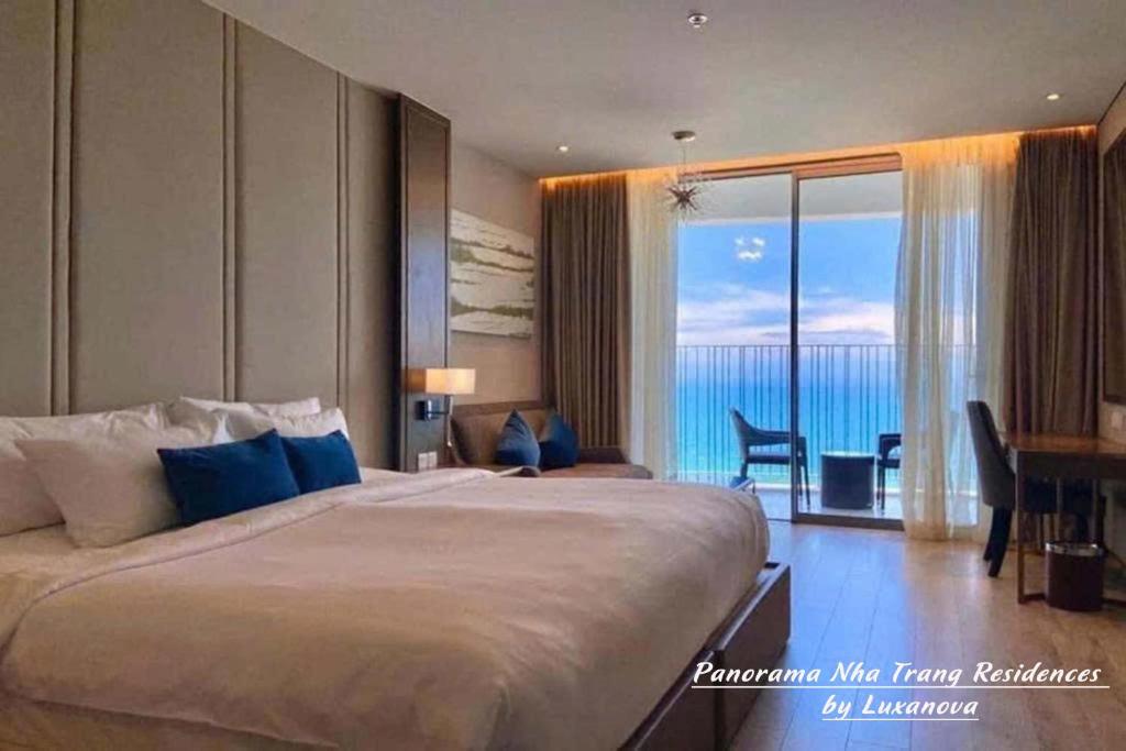 Postel nebo postele na pokoji v ubytování Panorama Nha Trang Residences by Luxanova