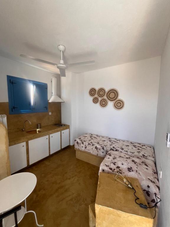 Postel nebo postele na pokoji v ubytování Villa Aigli