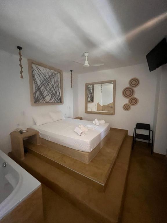 Postel nebo postele na pokoji v ubytování Villa Aigli