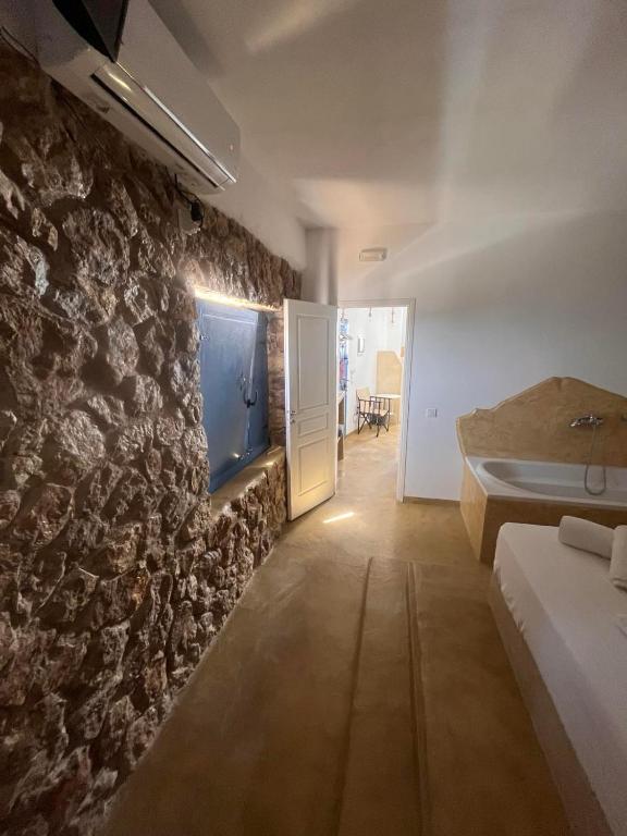 Postel nebo postele na pokoji v ubytování Villa Aigli
