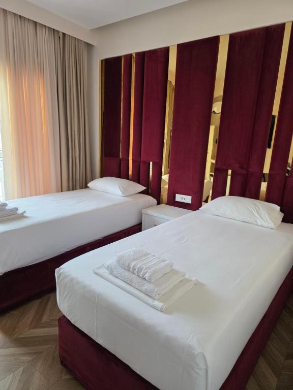 Postel nebo postele na pokoji v ubytování Almar Boutique Hotel