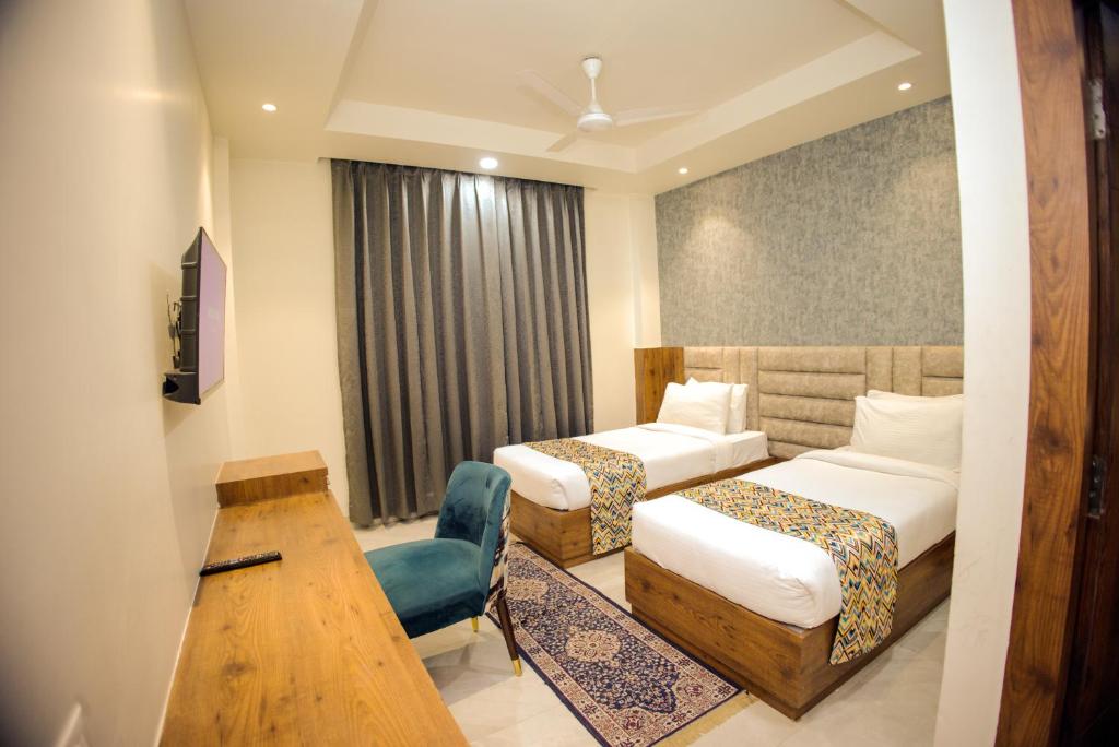 Postel nebo postele na pokoji v ubytování Hotel Marine House
