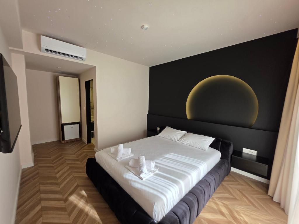 Postel nebo postele na pokoji v ubytování Almar Boutique Hotel