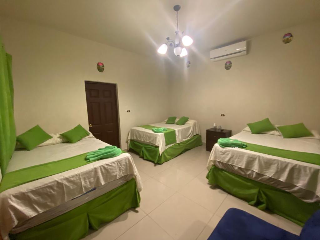 Ένα ή περισσότερα κρεβάτια σε δωμάτιο στο Termales El Paraíso