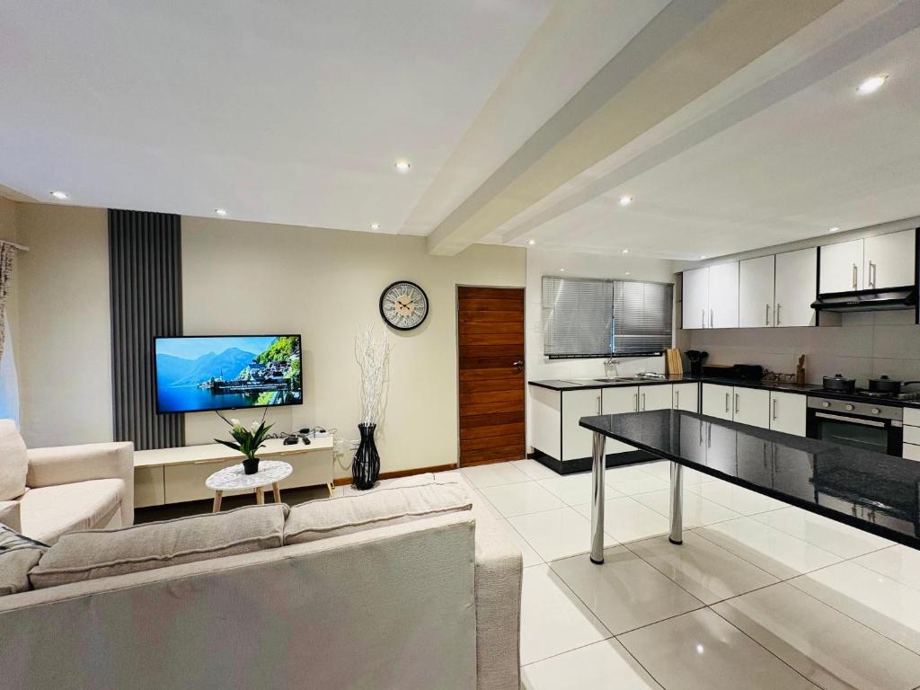 Η κουζίνα ή μικρή κουζίνα στο Goshen villas