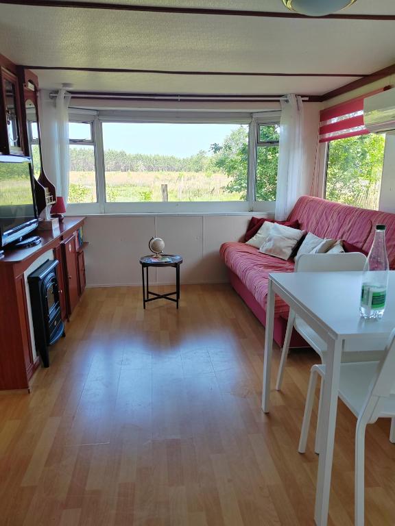 Kuchyň nebo kuchyňský kout v ubytování Agréable mobil home