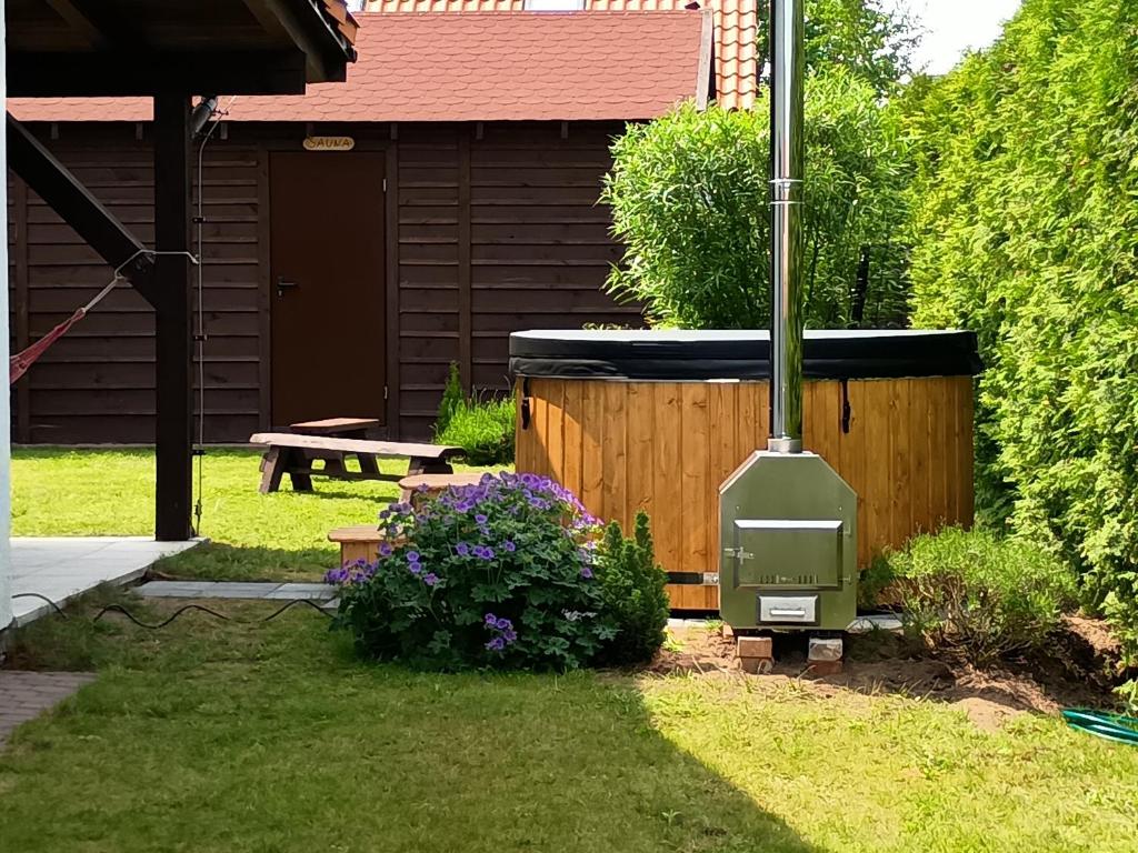 Vonkajšia záhrada v ubytovaní Dom Mazurska Apartamenty