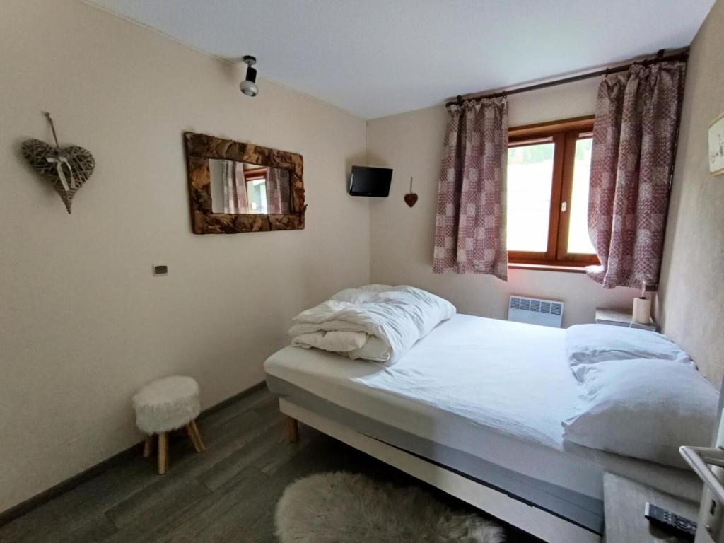 Posteľ alebo postele v izbe v ubytovaní Résidence Chamoisiere - Appartement spacieux pour 6/7 personnes MAE-8304