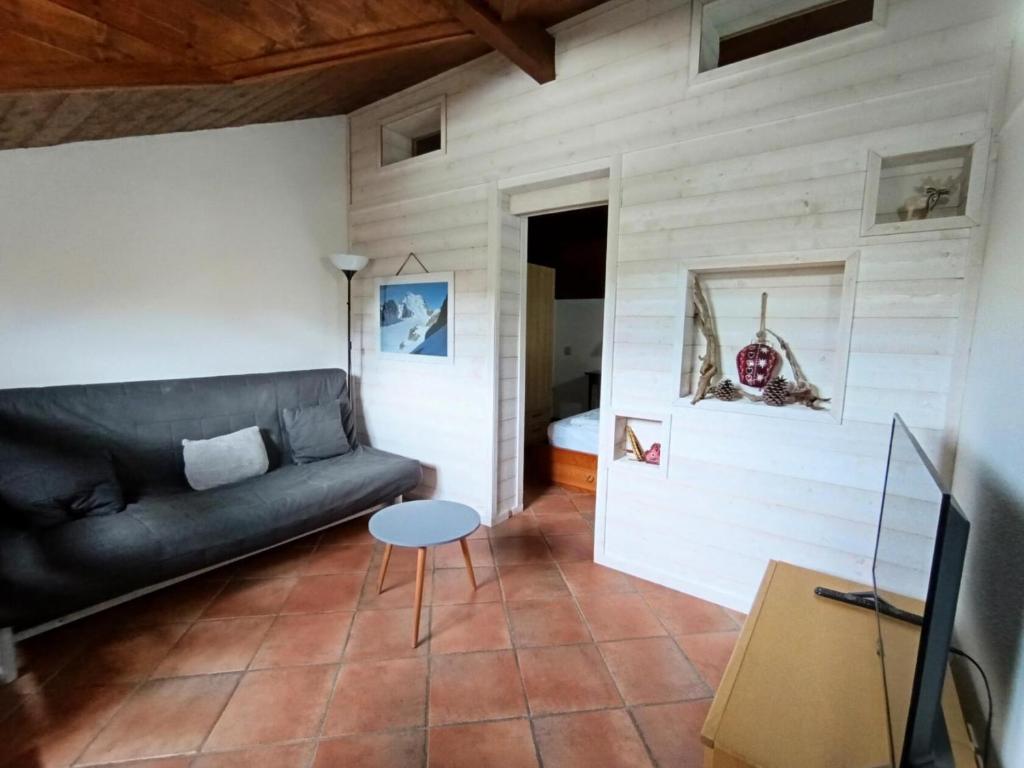 Televízia a/alebo spoločenská miestnosť v ubytovaní Résidence Korossol - Joli duplex au coeur du village MAE-8634