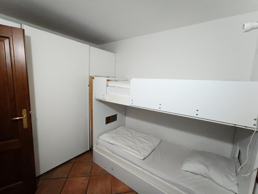 Posteľ alebo postele v izbe v ubytovaní Résidence Korossol - Joli duplex au coeur du village MAE-8634