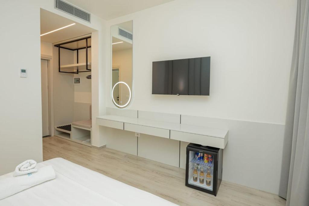Postel nebo postele na pokoji v ubytování Laid Hotel