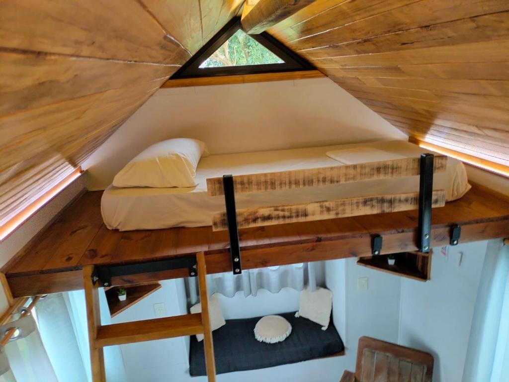 Letto o letti in una camera di Tiny House Nativa