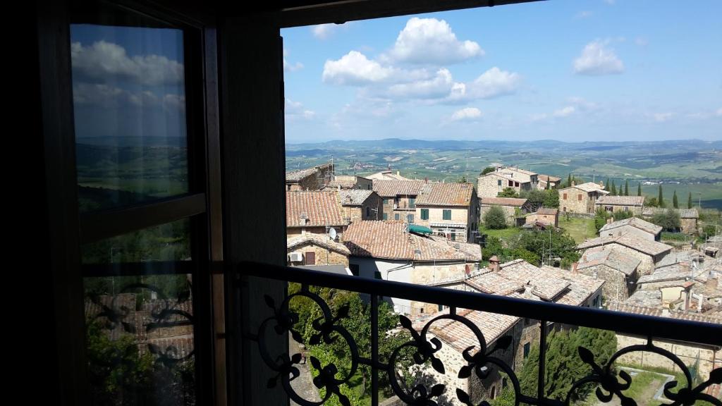 a view from a balcony of a building at Residenza Palazzo Saloni in Montalcino